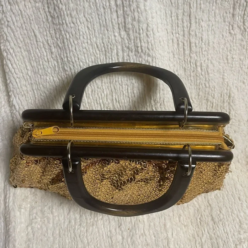 Gold Sequins with wooden black handles and frame handbag.